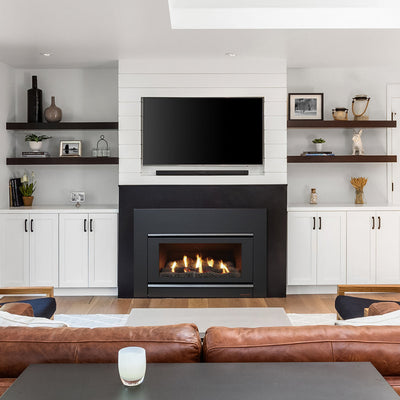 Azura 2.0 below a wall mounted TV in a family living room