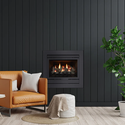 Matrix Small GFX-S in a dark panelled lounge with tan armchair